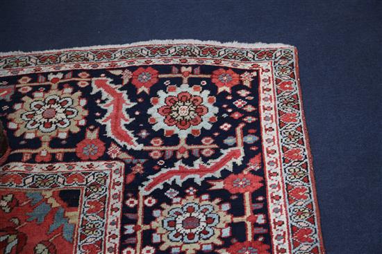 A Heriz carpet, 11ft 10in by 9ft 2in.